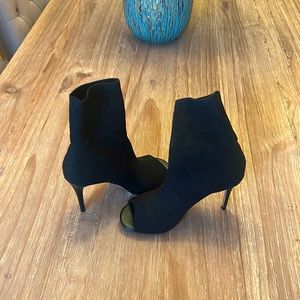 Only worn a few times and in excellent condition.  Peep Toe Sock Bootie.